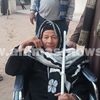 سيدة مسنة تدلي بصوتها 