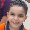 أم تحتفى بنجلها المتوفى فى أول يوم دراسة ببورسعيد: هافضل كل سنة أنزل صورتك زي ما كل الناس بتنزل صور عيالها