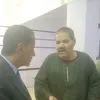 مستشار يساعد كفيف 