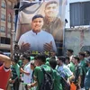 جماهير النادي المصري ترفع صورة طالب كلية الحقوق قبل ترحال نهائي الرابطة