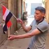 شاب يحرق علم مصر
