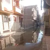 جانب من غرق الشوارع بالصرف 