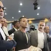 لحظة تقديم الكفن