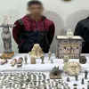 ضبط شابين بحوزتهما 521 قطعة أثرية في المنيا