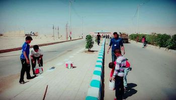 أطفال هوكي الصعيد بقنا يشاركون في تجميل شوارع نقادة