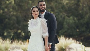 محمد الشرنوبي وزوجته راندا رياض 