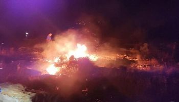 مستوطنون يضرمون النيران في قرية جالود