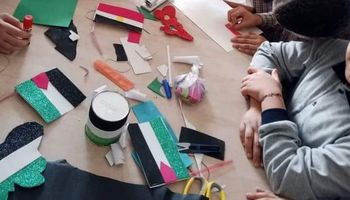 اطفال رسموا علم فلسطين تضامنا مع غزة
