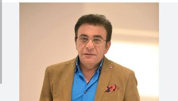 الإعلامي الراحل عاطف كامل 
