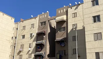 سترتها بعد ما زوجها خلص عليها .. جيران سيدة بورسعيد يروون: زوجها مثل بجثتها وقال لابنها تعالى انا قتلت أمك