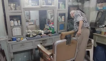 عم مصطفى حلاق العطارين