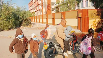 عودة الكمامات لمدارس قنا 