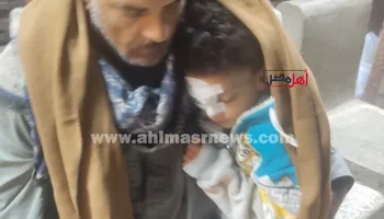 صورة عمر مع والده 