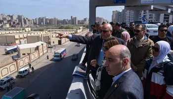 الدكتورة منال عوض والمهندس أيمن عطية