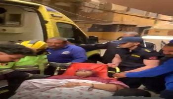  أمن القاهرة ينقل سيدة غير قادرة على الحركة إلى المستشفى