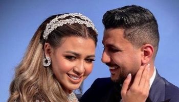 علي غزلان وفرح شعبان 