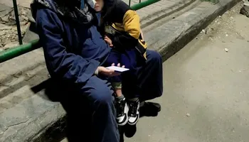 الطفل مع والده