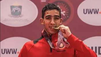 حسن الشحات بطل مصر في المصارعة 