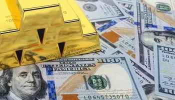 العلاقة بين االدولار والذهب 