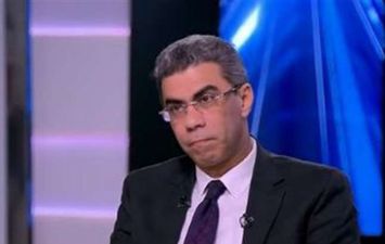 الصحفي ياسر رزق 