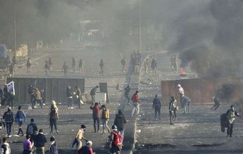 اشتباكات بين المتظاهرين وقوات الأمن في العراق