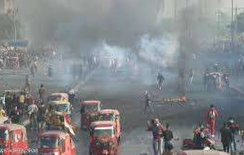 قتيل وجرحى بمواجهات المتظاهرين وقوات الأمن في بغداد