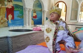 تعميد أول طفل بدير في الأقصر بعد غلقه بسبب كورونا