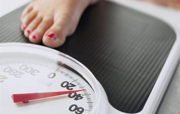 زيادة الوزن أثناء الدورة الشهرية 