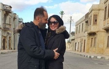 محمد محمود عبد العزيز وزوجته