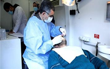 القافلة الطبية المجانية لجامعة القاهرة طب الأسنان بالفيوم 