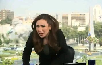 المذيعة أثناء فرارها 