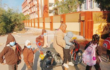 عودة الكمامات لمدارس قنا 