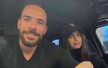 امال ماهر وزوجها 
