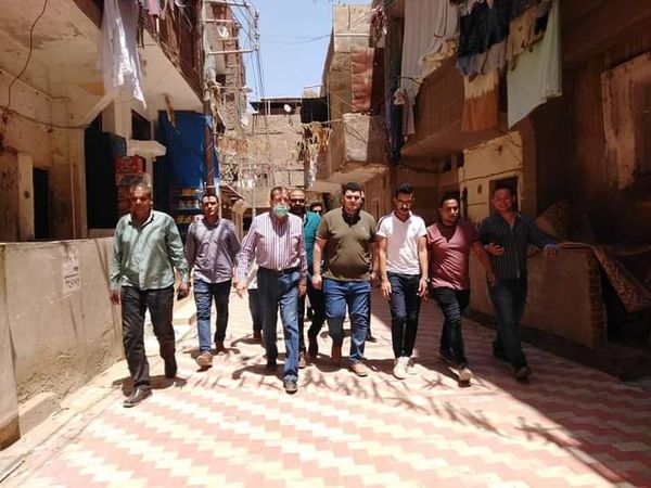 حملات لإزالة الإشغالات ومتابع رصف طرق حى ميت علوان بمدينة كفر الشيخ