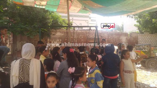 إقبال أطفال كفر الشيخ علي الملاهي الشعبية في العيد 