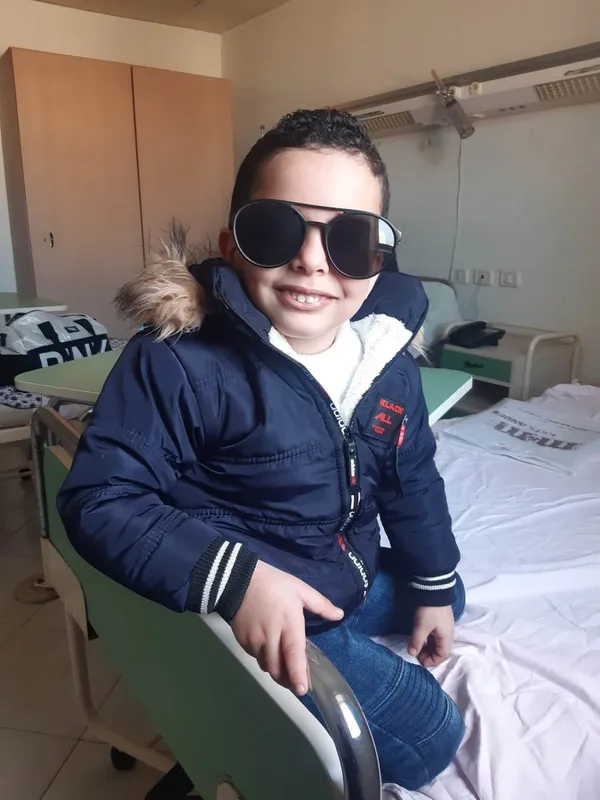أم تحتفى بنجلها المتوفى فى أول يوم دراسة ببورسعيد: هافضل كل سنة أنزل صورتك زي ما كل الناس بتنزل صور عيالها