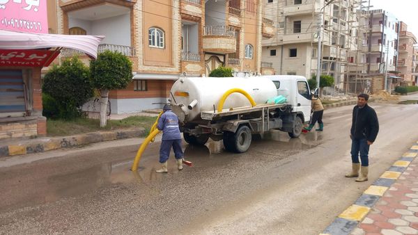 جانب من كسح مياه الأمطار  