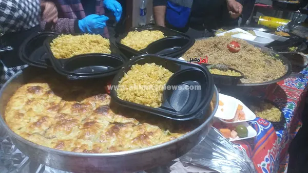 جانب من تجهيز الوجبات 