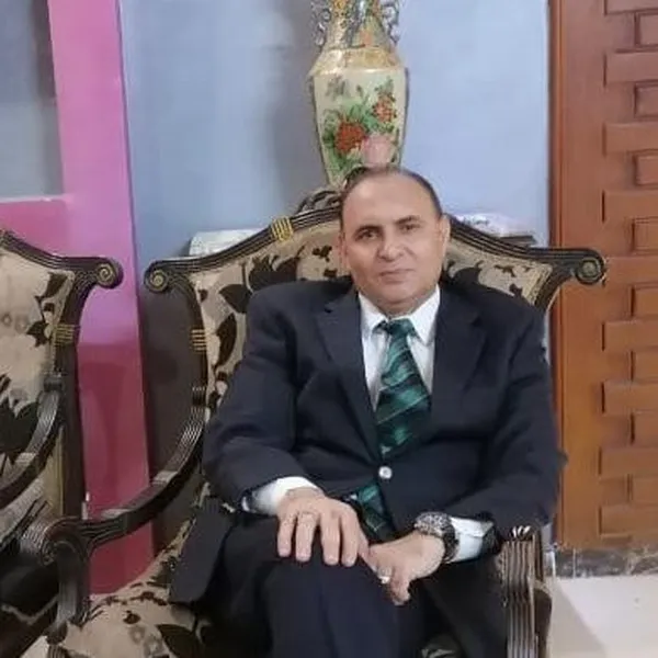 الأستاذ أحمد درويش والد العروس