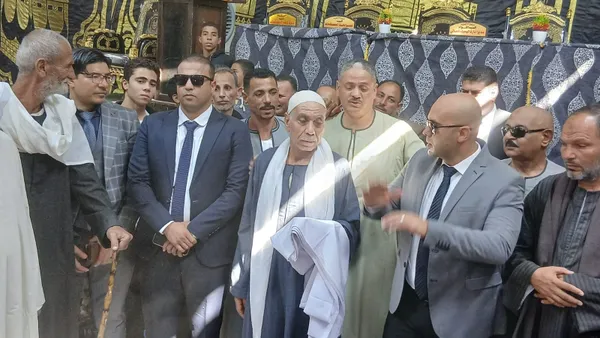 جانب من تسليم الكفن