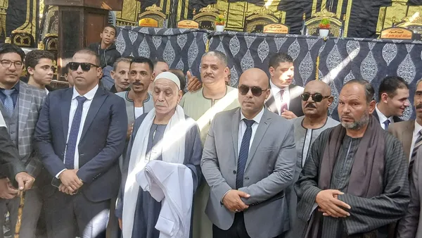 جانب من تسليم الكفن